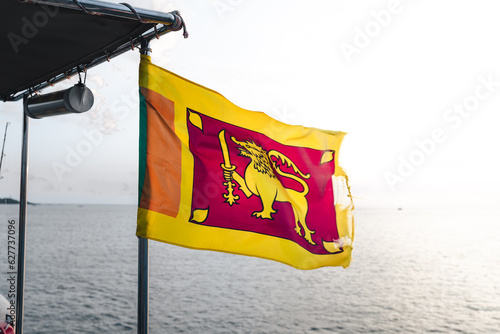Flag Sri Lanka on boat with sunset