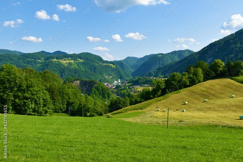 Valley in Slovene prealps in Štajerska, Slovenia with buildings in the town Zagorje ob Savi