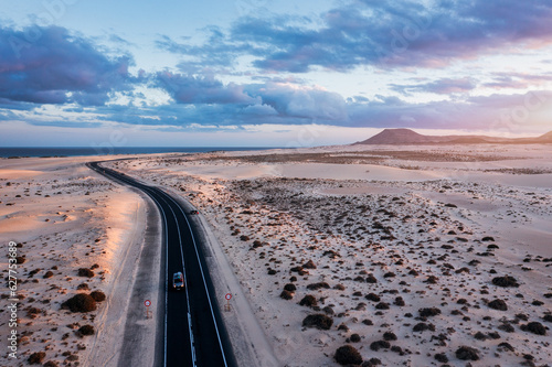 Panoramic high angle aerial drone view of Corralejo National Park  Parque Natural de Corralejo  with sand dunes located in the northeast corner of the island of Fuerteventura  Canary Islands  Spain.