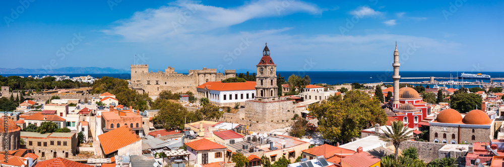 Panoramic view of Rhodes old town on Rhodes island, Greece. Rhodes old fortress cityscape with sea port at foreground. Travel destinations in Rhodes, Greece.