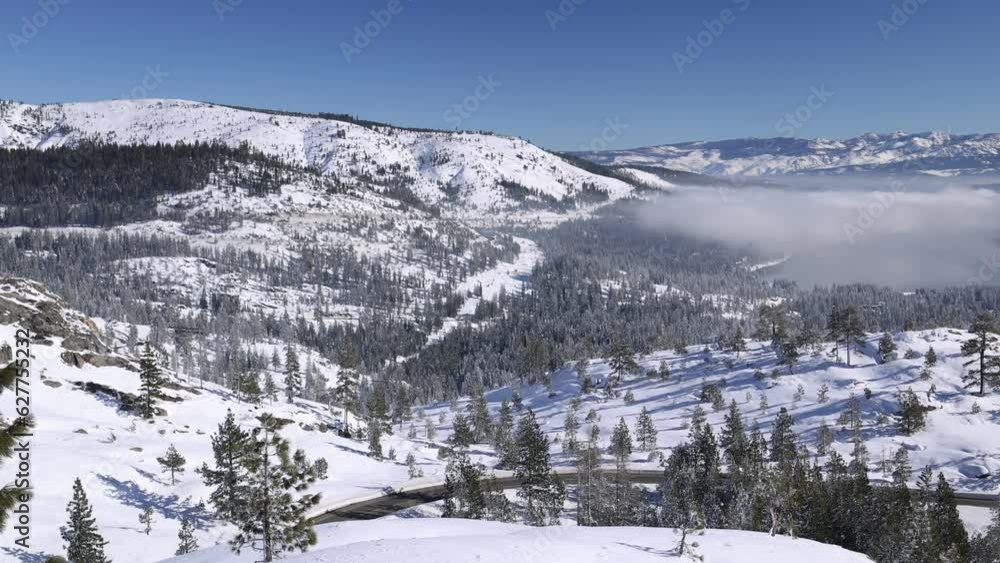 Donner Lake in Winter with Snow and Cloud Inversion - Shallow Depth of Field Donner Lake in Winter with Snow and Cloud Inversion - Shallow Depth of Field