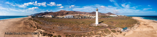 Lighthouse on Morro Jable beach on Jandia peninsula in sunrise light, Fuerteventura, Canary Islands, Spain. Faro de Morro Jable Lighthouse, Fuerteventura.
