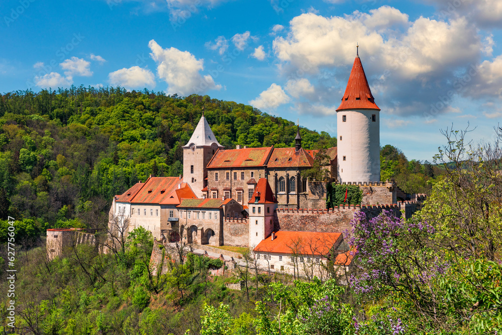 Aerial view of castle Krivoklat in Czech republic, Europe. Famous Czech medieval castle of Krivoklat, central Czech Republic. Krivoklat castle, medieval royal castle in Central Bohemia, Czechia. Aerial view of castle Krivoklat in Czech republic, Europe. Famous Czech medieval castle of Krivoklat, central Czech Republic. Krivoklat castle, medieval royal castle in Central Bohemia, Czechia.