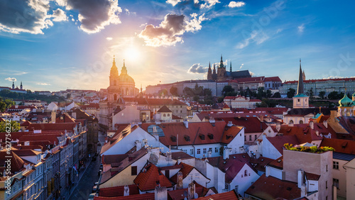 St. Vitus Cathedral, Prague Castle and Lesser Town panorama. View of St. Vitus Cathedral, Prague Castle and red roofs. Prague, Czech Republic. View of Prague Castle at sunset. Prague, Czech Republic