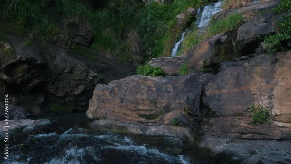 Ravana Falls. Sri Lanka. Powerful stream of water in rocky mountains. Ravana Falls. Sri Lanka. Powerful stream of water in rocky mountains.