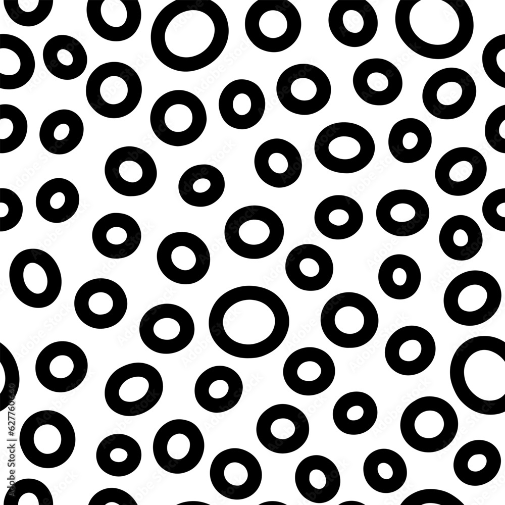 Seamless rings pattern. Black hand-drawn oval isolated on a white background. Doodle dots cozy ovate ornament. Vector dotted illustrations with circles for wallpaper, posters, wrapping paper, fabric