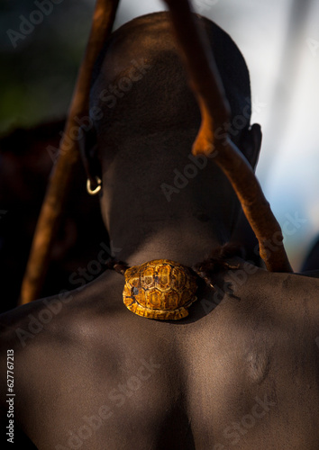 Bodi Tribe Warrior With A Turtle Necklace, Hana Mursi, Omo Valley, Ethiopia photo