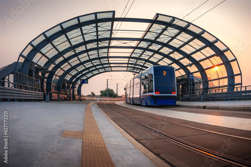 Tram on the viaduct during sunrise. Bydgoszcz trams.