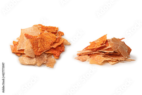 Group of tasty beer snacks. Dehydrated chicken meat slices.