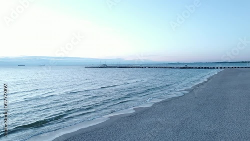 Coastal Dreams: Mesmerizing Sunrise Over the Baltic Waves in Sopot photo