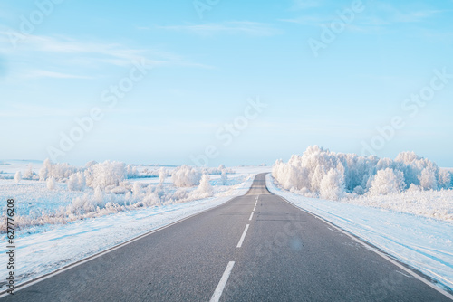 Winter landscape, car road, fresh frosty sunny day