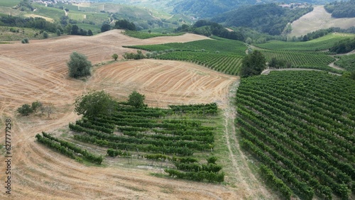 Europe, Italy , Montalto pavese Oltrepo' - drone aerial view of  wheat fields and vineyards in a hilltop village in the Apennines between Lombardy and Tuscany - wine production photo