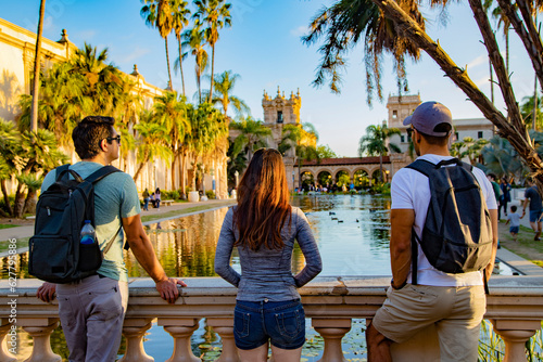 Tourists are standing at the Lily Pond at Balboa Park, San Diego, California.	