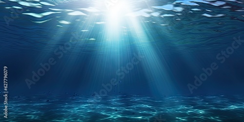 Beautiful blue ocean background with sunlight and undersea scene © Bussakon