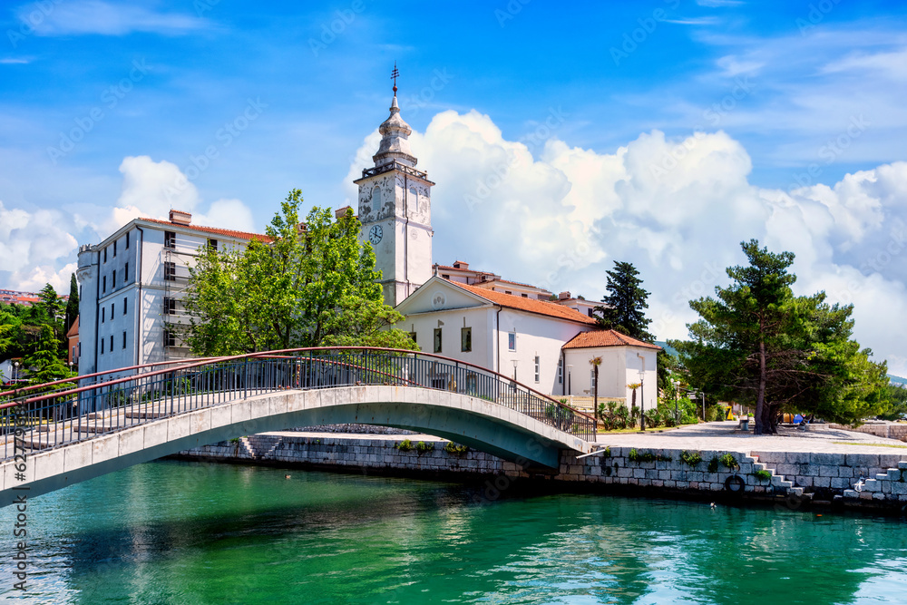 Crikvenica. Church of the Assumption of the Blessed Virgin Mary and Crikvenica waterfront view, Kvarner region of Croatia Crikvenica. Church of the Assumption of the Blessed Virgin Mary and Crikvenica waterfront view, Kvarner region of Croatia