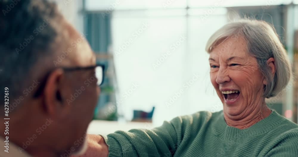 Love, hug and an elderly couple in their home together for support, trust or care during retirement. Diversity, smile or happy with a senior woman and man embracing for romance in their house Love, hug and an elderly couple in their home together for support, trust or care during retirement. Diversity, smile or happy with a senior woman and man embracing for romance in their house