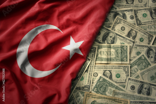 Fototapeta Naklejka Na Ścianę i Meble -  colorful waving national flag of turkey on a american dollar money background. finance concept