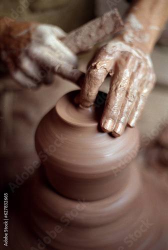 hands of a potter in a long exposure, Film Camera 