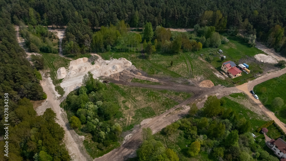 Top drone view of construction site near forest. White sand. Nature of Jurmala. Modern house. Top drone view of construction site near forest. White sand. Nature of Jurmala. Modern house.