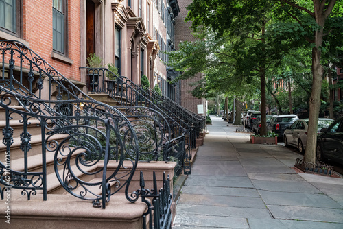 Famous Brooklyn Street, showing the sidewalk and the houses. photo