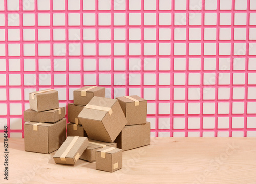 Fotografie Cardboard boxes piled on the table