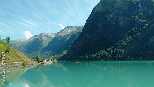 Norwegian landscape with bluish green lake Oldevatnet in Oldedalen valley.