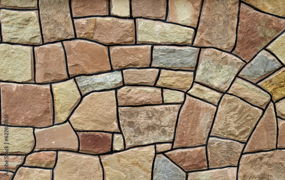 Obraz premium Split red natural stone is used in construction