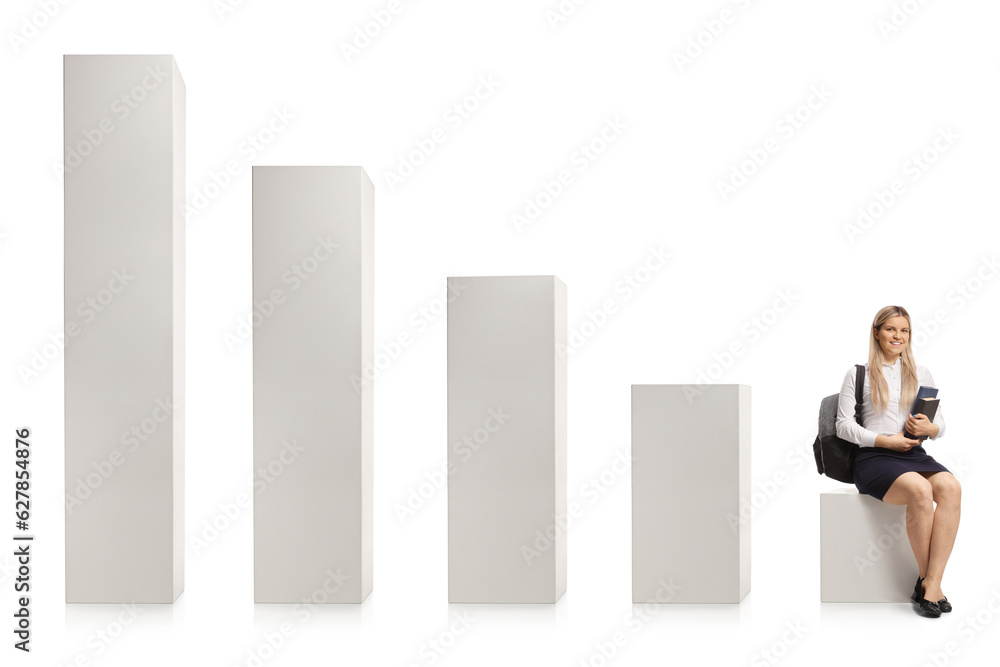 Female college student sitting on a bar chart and holding books Female college student sitting on a bar chart and holding books