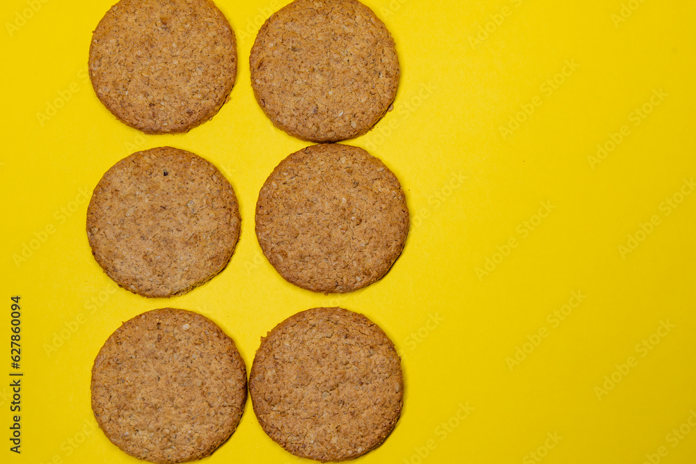 oatmeal cookies on a yellow background oatmeal cookies on a yellow background