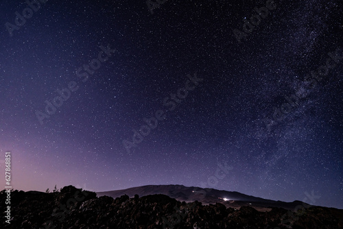 Stargazing at Mauna Loa Observatory Road, Big Island Hawaii. Starry night sky, Milky Way galaxy astrophotography. Mauna Kea
