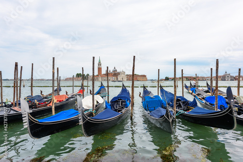 Venice, Italy - June 30, 2023: Venice canal shot from gondola, Italy  © nedomacki