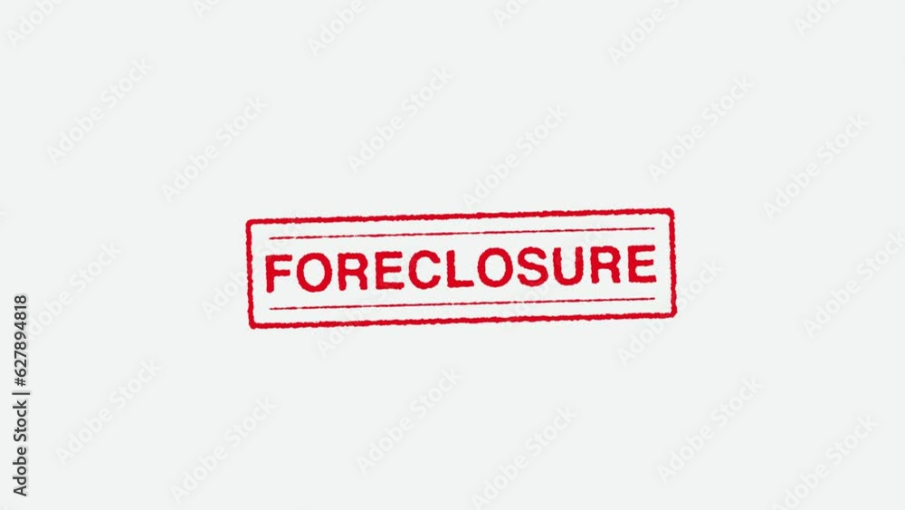Close Up Real Hand Stamping Foreclosure Stamp on White Background Close Up Real Hand Stamping Foreclosure Stamp on White Background
