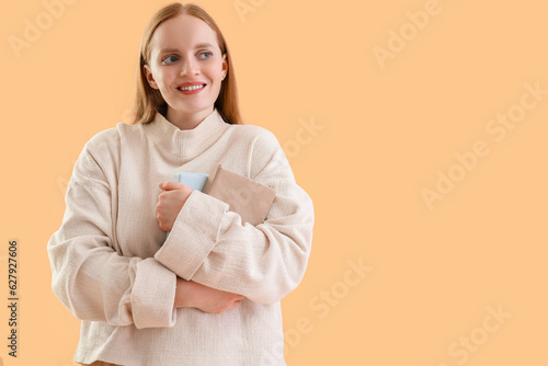 Young woman with books on b...