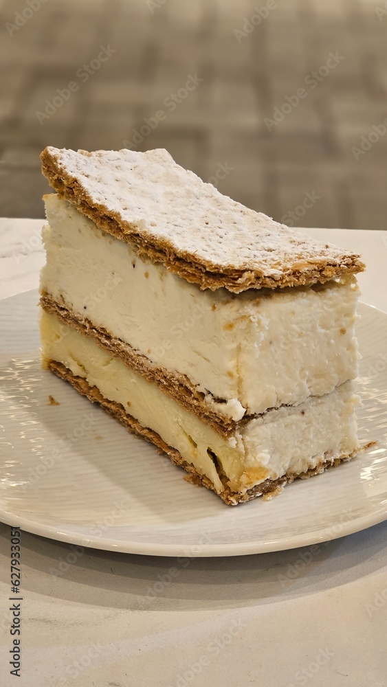 puff pastry with a whipped pastry cream napoleon cake in bakery Stock