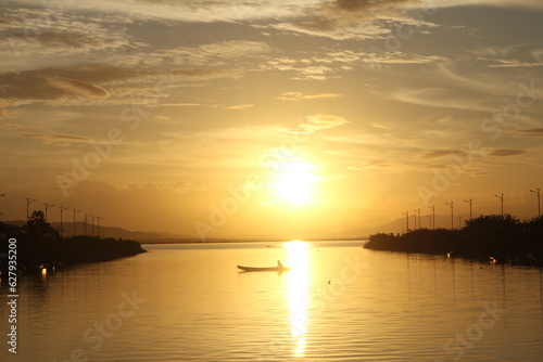Beautiful golden sunset on the lake © Palugada