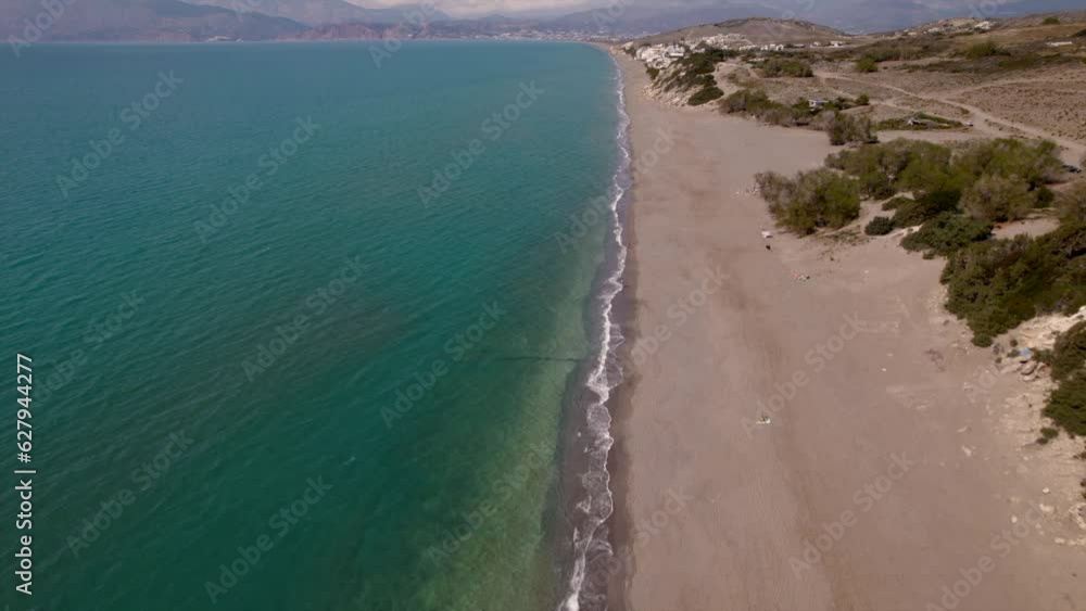 4K drone. Matala is a is a village located in the south of Crete, Greece. With a beautiful beach with cliffs, caves, ruins, restaurants and shops. Is a hippie area on this paradisiac Island 4K drone. Matala is a is a village located in the south of Crete, Greece. With a beautiful beach with cliffs, caves, ruins, restaurants and shops. Is a hippie area on this paradisiac Island
