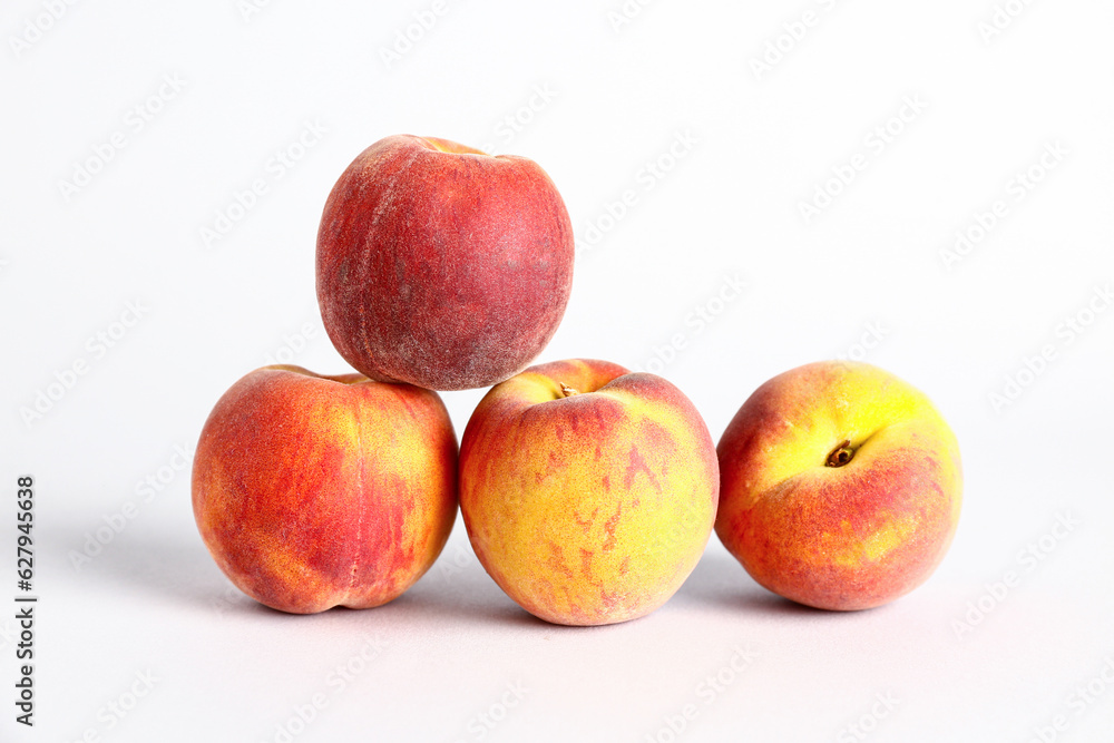 Sweet peaches on white background Sweet peaches on white background