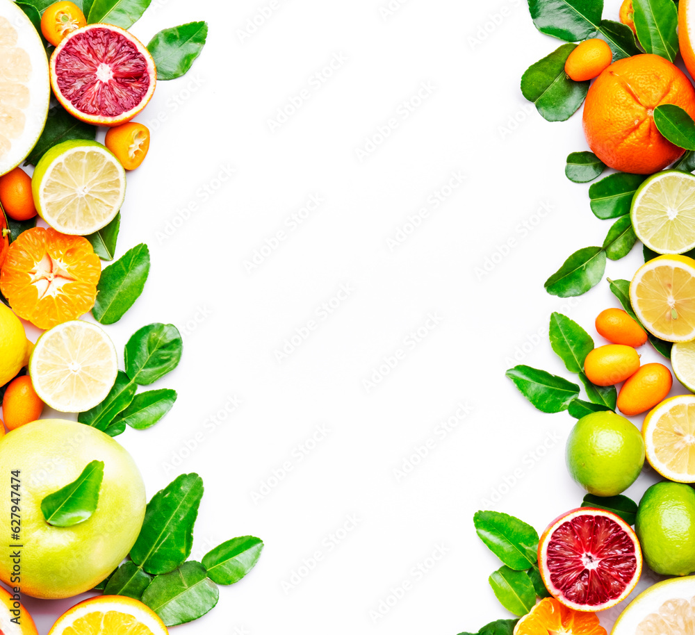 Colorful citrus fruits, food background, top view. Mix of different fruits: orange, grapefruit, lemon, lime and other with leaves on white table. Top view, copy space Colorful citrus fruits, food background, top view. Mix of different fruits: orange, grapefruit, lemon, lime and other with leaves on white table. Top view, copy space