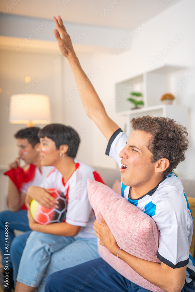 Fototapeta premium Man shouting while watching a soccer game