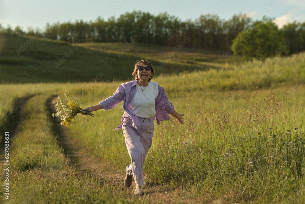 Happy senior woman cherishing a day in the meadow, embodying the security and calm offered by sound financial planning Happy senior woman cherishing a day in the meadow, embodying the security and calm offered by sound financial planning