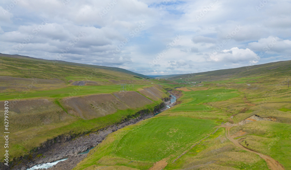 Fototapeta premium Aerial top view of mountains in Iceland islands in the summer season, Europe hills, nature landscape background.