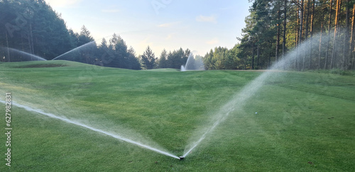 Sports ground is irrigated with sprinkler system or golf course