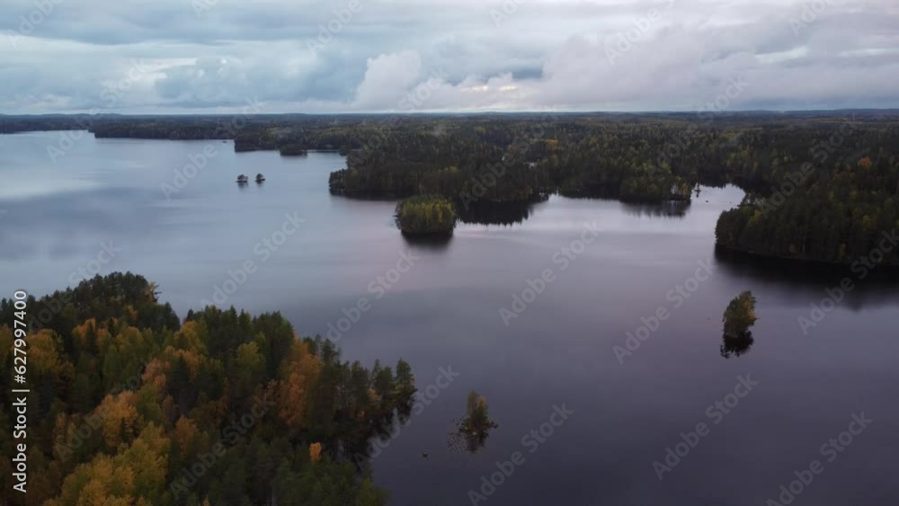 Aerial video of autumn forests by lake Pukala in Finland Aerial video of autumn forests by lake Pukala in Finland