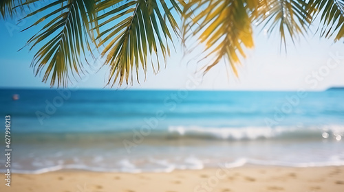 Golden sand at tropical beach. Beautiful background for summer vacation and travel. blurry palm leaves and sea on sunny day