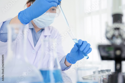 Young female scientist working in the laboratory.