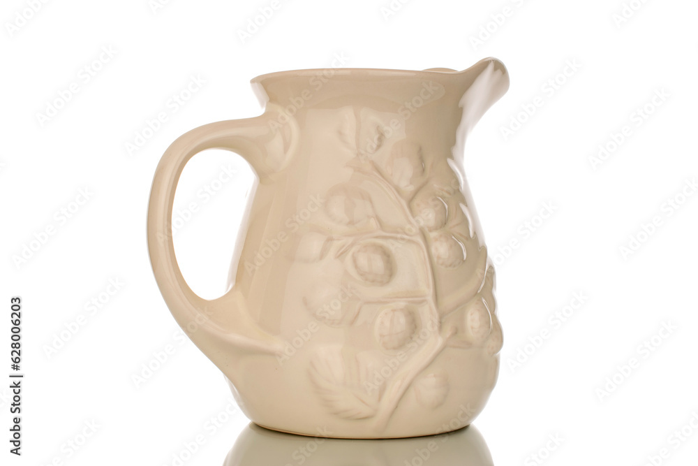 One ceramic jug, macro, isolated on white background.