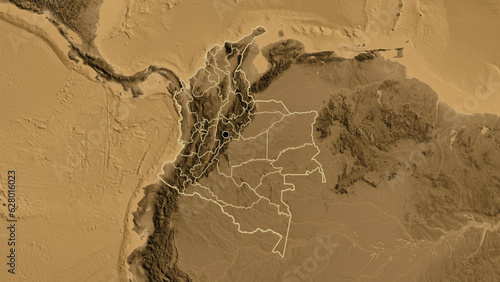 Shape of Colombia with regional borders. Sepia elevation.