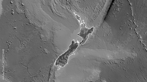 Shape of New Zealand. Outlined. Grayscale.