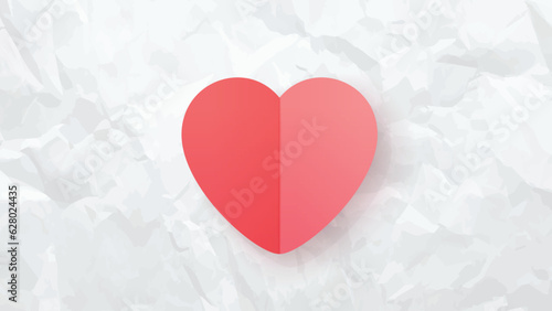 red heart on white creased paper back