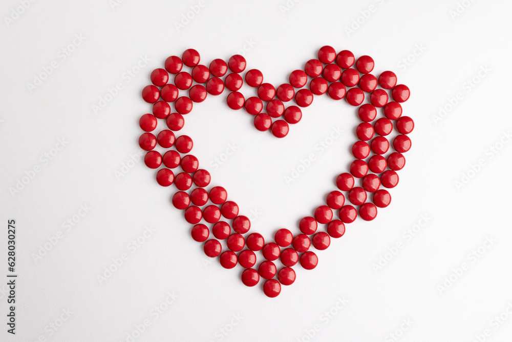 heart made of red medicine pills. heart made of red medicine pills.